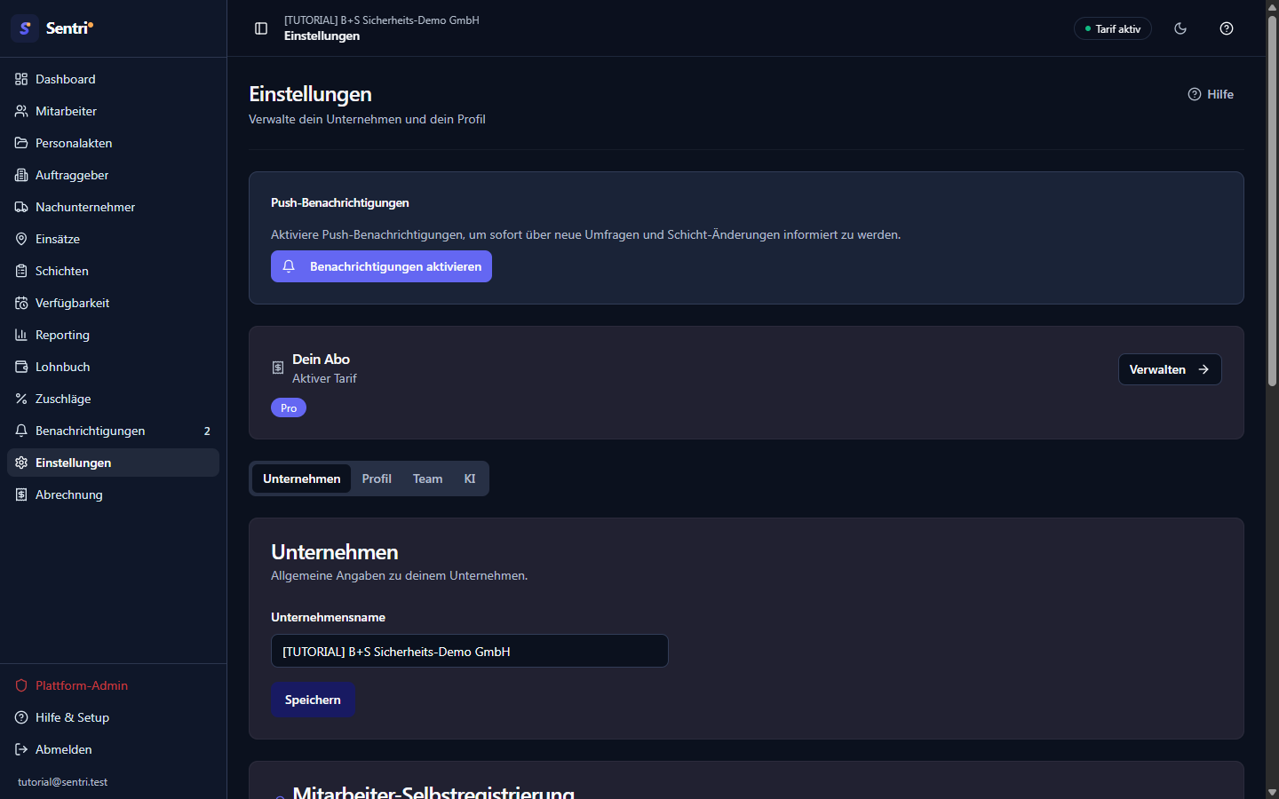 Einstellungen-Seite mit den vier Reitern (Unternehmen/Profil/Team/KI) oben, darüber die Kacheln Push-Benach…